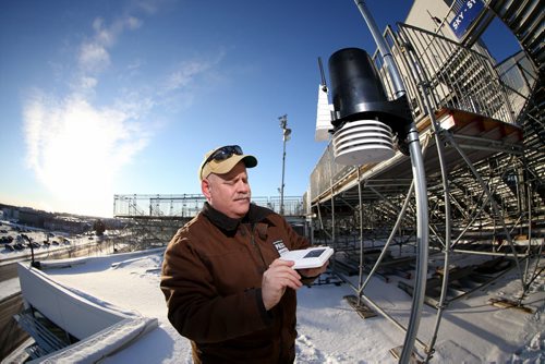 Guy Ash checks on one of his weather stations at Investors Group Field prior to Sundays Grey Cup, Thursday, November 26, 2015. (TREVOR HAGAN/WINNIPEG FREE PRESS)