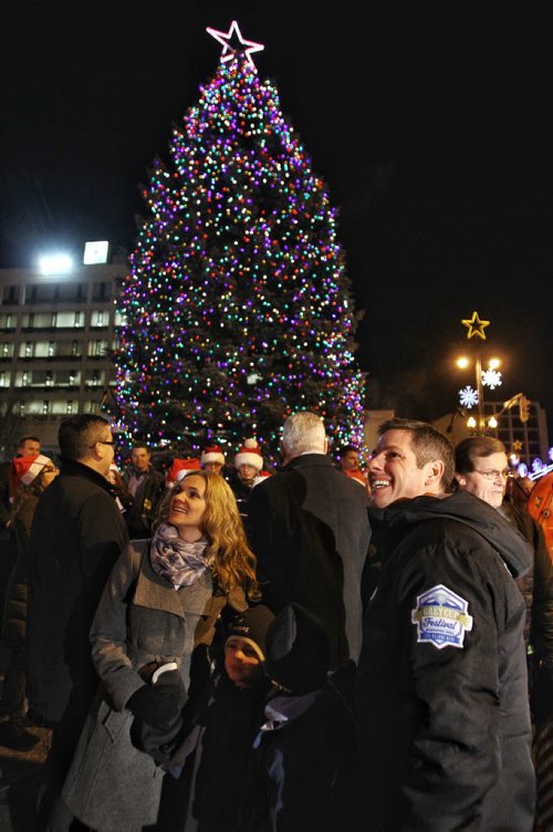 Mayor Brian Bowman and his family look at all the holiday lights that were lit up along with the huge tree at City Hall Thursday evening.  151126 November 26, 2015 MIKE DEAL / WINNIPEG FREE PRESS