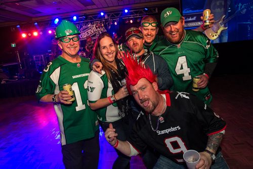 Members of Ridernation party down in Riderville during the Grey Cup Festival Thursday evening at the RBC Convention Centre. 151126 - Thursday, November 26, 2015 -  MIKE DEAL / WINNIPEG FREE PRESS