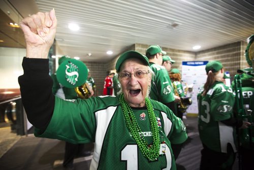 Roughriders fan and pep band member Gwen Seed celebrates Grey Cup at the RBC Convention Centre in Winnipeg on Friday, Nov. 27, 2015.   (Mikaela MacKenzie/Winnipeg Free Press)