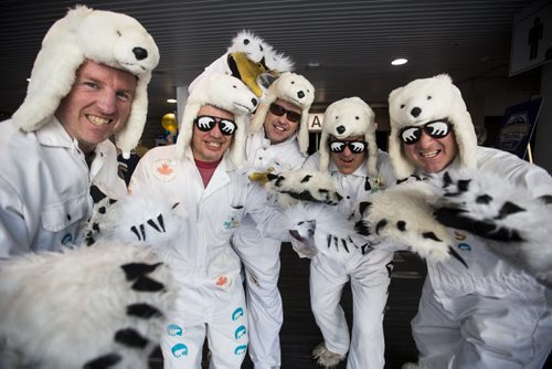 NWT Polar Bear supporters Vance Alexander (left), Eddy Bunting, Peter Morissette, Mark Sproxton, and Gary Lalonde celebrate Grey Cup at the RBC Convention Centre in Winnipeg on Friday, Nov. 27, 2015.   (Mikaela MacKenzie/Winnipeg Free Press)