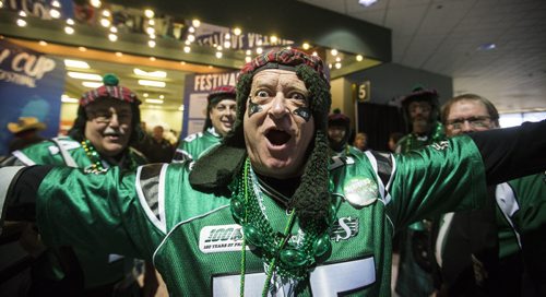 Bruce Tait and his McRiders celebrate Grey Cup at the RBC Convention Centre in Winnipeg on Friday, Nov. 27, 2015.   (Mikaela MacKenzie/Winnipeg Free Press)