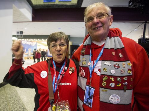 Calgary Stampeder fans M.J. (left) and Nervin Nelson celebrate Grey Cup at the RBC Convention Centre in Winnipeg on Friday, Nov. 27, 2015.   (Mikaela MacKenzie/Winnipeg Free Press)