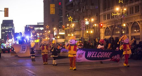 Festivities take place at the Santa Claus/Grey Cup parade on Portage Avenue in Winnipeg on Saturday, Nov. 28, 2015.   (Mikaela MacKenzie/Winnipeg Free Press)