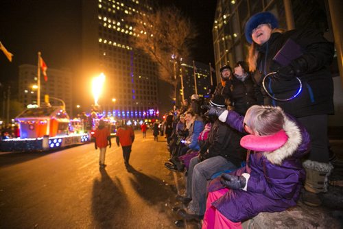 Festivities take place at the Santa Claus/Grey Cup parade on Portage Avenue in Winnipeg on Saturday, Nov. 28, 2015.   (Mikaela MacKenzie/Winnipeg Free Press)