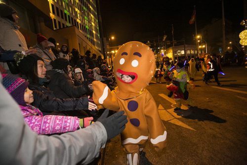 Festivities take place at the Santa Claus/Grey Cup parade on Portage Avenue in Winnipeg on Saturday, Nov. 28, 2015.   (Mikaela MacKenzie/Winnipeg Free Press)