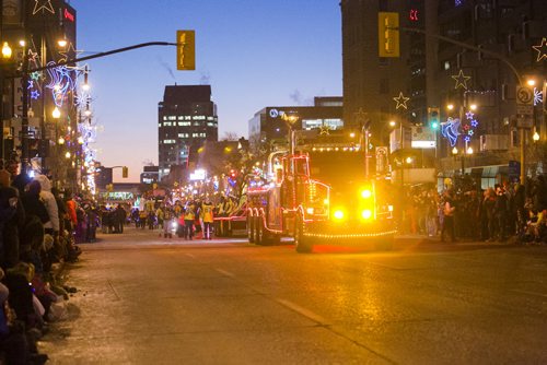 Festivities take place at the Santa Claus/Grey Cup parade on Portage Avenue in Winnipeg on Saturday, Nov. 28, 2015.   (Mikaela MacKenzie/Winnipeg Free Press)