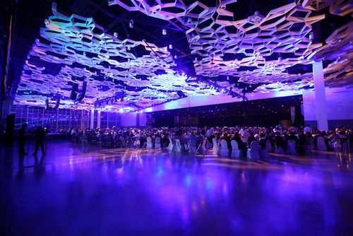 People eat and mingle in the new section of the RBC Convention Centre at a Grey Cup gala dinner in Winnipeg on Saturday, Nov. 28, 2015.   (Mikaela MacKenzie/Winnipeg Free Press)