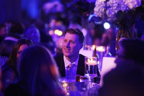 Drew Willy chats with tablemates at the Grey Cup gala dinner in Winnipeg on Saturday, Nov. 28, 2015.   (Mikaela MacKenzie/Winnipeg Free Press)