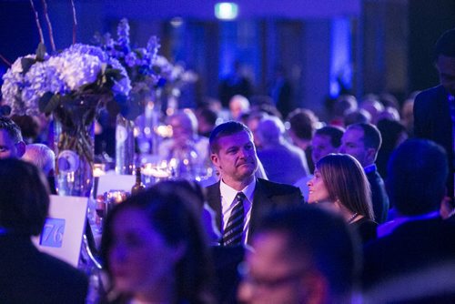 Head Coach Mike O'Shea eats and mingles in the new section of the RBC Convention Centre at a Grey Cup gala dinner in Winnipeg on Saturday, Nov. 28, 2015.   (Mikaela MacKenzie/Winnipeg Free Press)