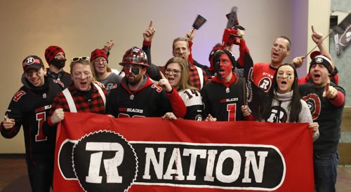 Red Black fans at the RBC Convention Centre Sunday prior to the Fan March with the Grey Cup to The Forks.Geoff Kirbyson Wayne Glowacki / Winnipeg Free Press Nov. 29    2015