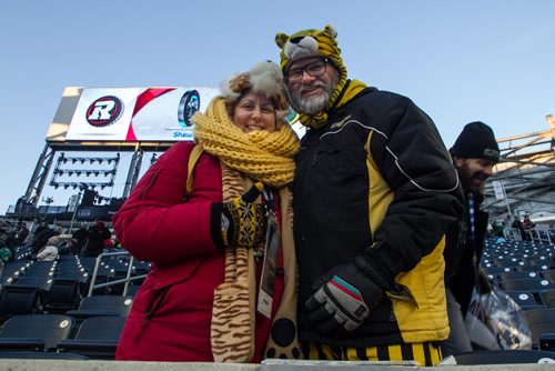 Fans Stephanie Rapko and Lance Whittaker (right) before the Grey Cup championship game against the Edmonton Eskimos and the Ottawa Redblacks in Winnipeg, November 29, 2015. 151129 - Sunday, November 29, 2015 -  MIKE DEAL / WINNIPEG FREE PRESS