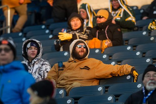 Fans take their seats and relax before the Grey Cup championship game against the Edmonton Eskimos and the Ottawa Redblacks in Winnipeg, November 29, 2015. 151129 - Sunday, November 29, 2015 -  MIKE DEAL / WINNIPEG FREE PRESS