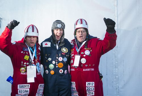 Kevin Ryan (left), James Salverta, and Barry Ryan cheer before the Grey Cup at Investors Group Field in Winnipeg on Sunday, Nov. 29, 2015.   (Mikaela MacKenzie/Winnipeg Free Press)