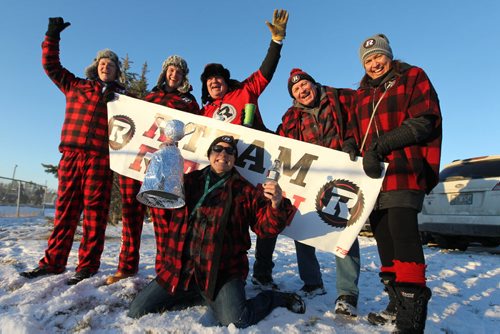 Redblack fans from Ottawa dressed in red and black plaid and had tailgate parties in the parking lot next to the Stadium prior to the 103rd  Grey Cup between the Ottawa Redblacks and the Edmonton Eskimos at Investors Group Stadium in Winnipeg on Sunday, Nov. 29, 2015.  Nov 29, 2015 Ruth Bonneville / Winnipeg Free Press
