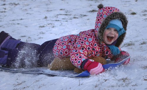 Kayden Lusty,3, out with her parents at The Forks on the the mild Sunday afternoon thoroughly enjoyed her tiime sliding.  Wayne Glowacki / Winnipeg Free Press Nov. 29    2015