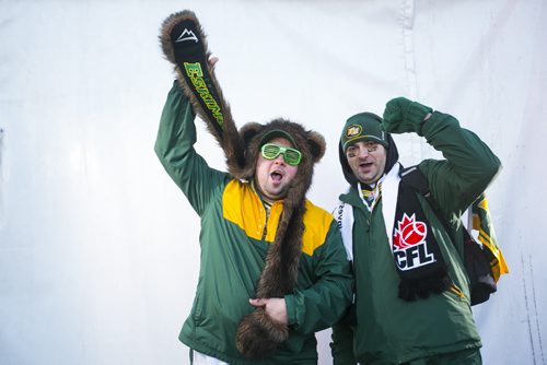 Jim Linton (left) and Lukasz Rojck cheer before the Grey Cup at Investors Group Field in Winnipeg on Sunday, Nov. 29, 2015.   (Mikaela MacKenzie/Winnipeg Free Press)