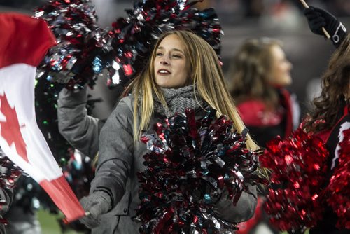 Cheerleaders from all the CFL teams take to the field during the pre-game show at the Grey Cup championship game against the Edmonton Eskimos and the Ottawa Redblacks in Winnipeg, November 29, 2015. 151129 - Sunday, November 29, 2015 -  MIKE DEAL / WINNIPEG FREE PRESS