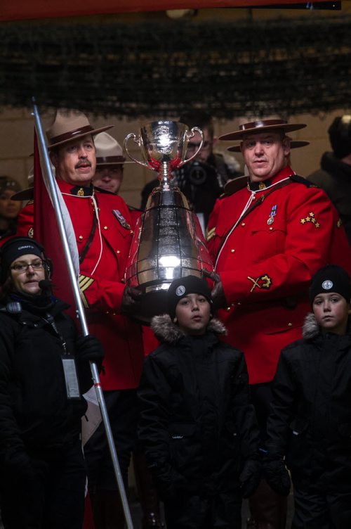 The Grey Cup is guarded by RCMP officers in the tunnel before entering the field during the pre-game show at the Grey Cup championship game against the Edmonton Eskimos and the Ottawa Redblacks in Winnipeg, November 29, 2015. 151129 - Sunday, November 29, 2015 -  MIKE DEAL / WINNIPEG FREE PRESS