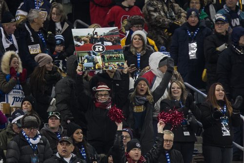 Fans react to the pre-game show during the Grey Cup championship game against the Edmonton Eskimos and the Ottawa Redblacks in Winnipeg, November 29, 2015. 151129 - Sunday, November 29, 2015 -  MIKE DEAL / WINNIPEG FREE PRESS