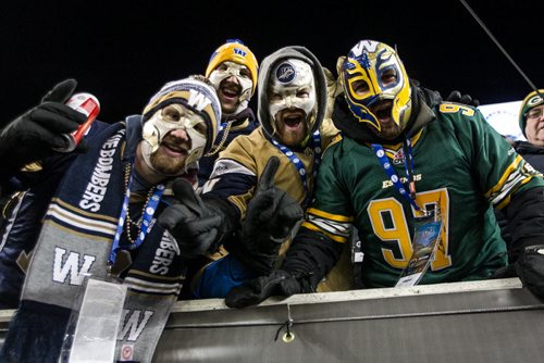 Fans react during the pre-game show at the Grey Cup championship game against the Edmonton Eskimos and the Ottawa Redblacks in Winnipeg, November 29, 2015. 151129 - Sunday, November 29, 2015 -  MIKE DEAL / WINNIPEG FREE PRESS