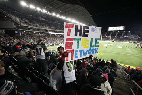 WInnipeger Brad Black holds up a sign saying "The Steele Network" as he cheers on Edmonton with friends just before halftime at the 103rd  Grey Cup  between the Ottawa Redblacks and the Edmonton Eskimos at Investors Group Stadium in Winnipeg on Sunday, Nov. 29, 2015.  Nov 29, 2015 Ruth Bonneville / Winnipeg Free Press