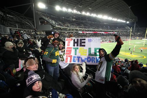 WInnipeger Brad Black (far right)  holds up a sign saying "The Steele Network" as he cheers on Edmonton with friends just before halftime at the 103rd  Grey Cup  between the Ottawa Redblacks and the Edmonton Eskimos at Investors Group Stadium in Winnipeg on Sunday, Nov. 29, 2015.  Nov 29, 2015 Ruth Bonneville / Winnipeg Free Press