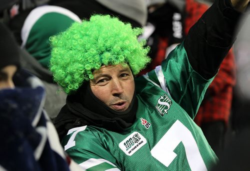 Saskatchewan fan Doug Stephan is all smiles at  the 103rd  Grey Cup  between the Ottawa Redblacks and the Edmonton Eskimos at Investors Group Stadium in Winnipeg on Sunday, Nov. 29, 2015.  Nov 29, 2015 Ruth Bonneville / Winnipeg Free Pres