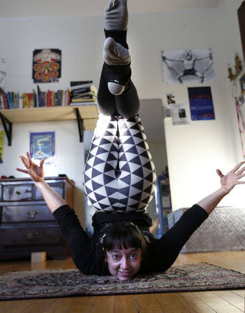49.8 - TRAINING BASKET.  The profile is on Samantha Halas, a contortionist and antipodist (she juggles with her feet). She is practicing poses in studio at home. Scott Billeck  story   Wayne Glowacki / Winnipeg Free Press Nov. 30   2015