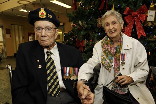 Cpl. (Ret.) Ian Wilson, a resident of Deer Lodge Centre, and his wife, ACW2 (Ret.) Betty Wilson, who served in Great Britain, each received a Certificate of Recognition for their service during the Second World War signed by the Prime Minister of Canada. Betty also received Her Majestys Armed Forces Veterans Badge and the War Medal 1939-1945 for service to her country. The ceremony was held in the front lobby of Deer Lodge Centre in front of many other veterans who reside there.  December 01, 2015 Mike Deal / Winnipeg Free Press