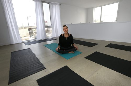 Commercial Real Estate Column.   Alessandra Conicella, Yoga Teacher/Owner of a new yoga studio Called Raw Yoga located at 530 Waterfront Drive which opened last week.  This is the first and only yoga studio on Waterfront Drive.   Murray McNeill story   Wayne Glowacki / Winnipeg Free Press Dec. 2  2015