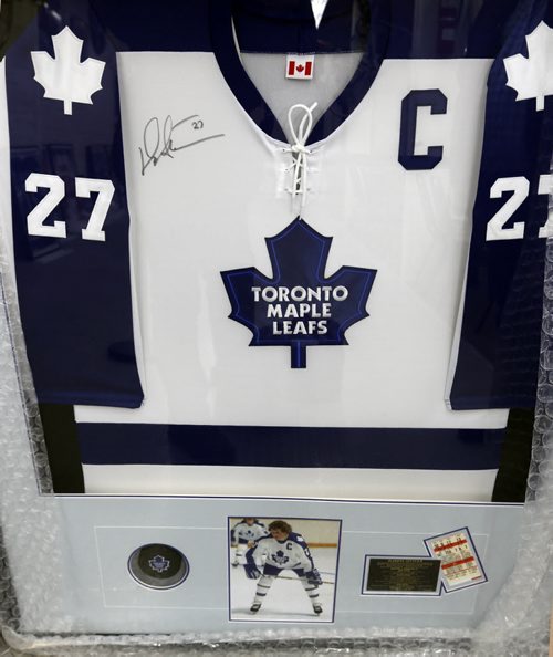 Framed signed Darryl Sittler jersey at Kaye's Auction.  Kaye's is auctioning off a bunch of memorabilia in support of the Selkirk and District Community Foundation. It's willed to the auction by Bob Jefferson. Scott Billeck story   Wayne Glowacki / Winnipeg Free Press Dec. 2  2015