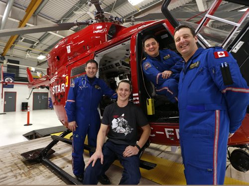 In centre, Paul Neufeld, was flown to the hospital by the STARS air ambulance after he was critically injured in a head on car collision on Hwy.44. On Thursday, he visited with the crew that saved him on the night of his accident, from right Pilot Paul Adams, Pilot Jason Graveline, and Flight Paramedic Grant Therrien. There were also two Critical Care Nurses Chad Chapman and Vicki Wilson that were on aboard that helped care for Paul.  Scott Billeck story   Wayne Glowacki / Winnipeg Free Press Dec. 3  2015
