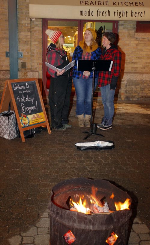 WINNIPEG, MB - The Forks Market Holiday Bazaar. The Forks Market is kicking off the holiday season with a fun shopping event for all. Outside The Timber Trio singers do some carolling. L-R Andraea Sartison, Jacquline Harding, and Claire Therese. BORIS MINKEVICH / WINNIPEG FREE PRESS  DEC 3, 2015