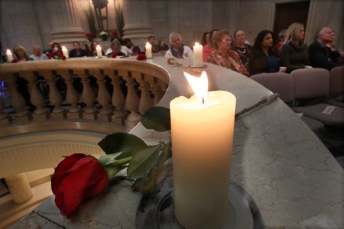 14 Roses and candles honouring the14 women who were murdered at Lecole Polytechnique in Montreal on Dec. 6, 1989. A panel discussion on sexual violence on campus with students from post-secondary schools took place today in the Rotunda of the Manitoba Legislative Building Friday.- See Bill Redekop StoryDec 04, 2015   (JOE BRYKSA / WINNIPEG FREE PRESS)