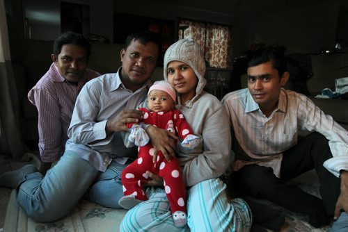 Rohingya Muslim refugees from Myanmar where they were persecuted by Buddhists and had no rights, now are settled in Wpg. Names from left: Mohammed Tayab, Omar Sarduk (dad of baby), Khin Khin Tay (mom), Thoudada Nay (baby, 3 months) and Hafzur Rahaman. See Carol Sanders story. Dec 04, 2015 Ruth Bonneville / Winnipeg Free Press