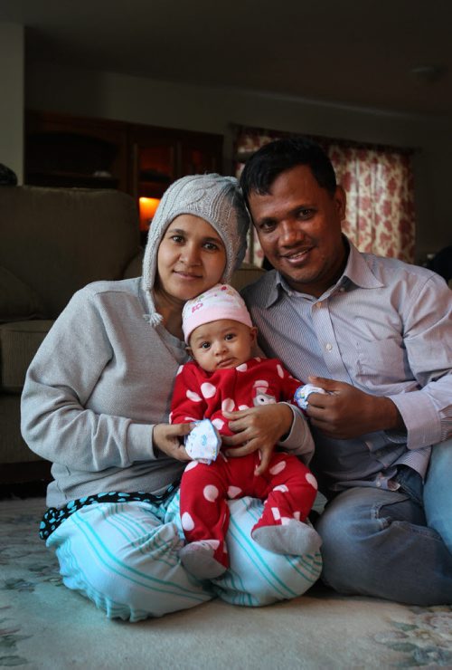 49.8: A pic for Year of the Refugee feature running in 49.8 on Jan. 2 of the couple and their baby: Omar Sarduk, 39, his wife Khin Khin Tay, 28, and their baby girl Thoudada Nay (3 months)   See Carol Sanders story. Dec 04, 2015 Ruth Bonneville / Winnipeg Free Press