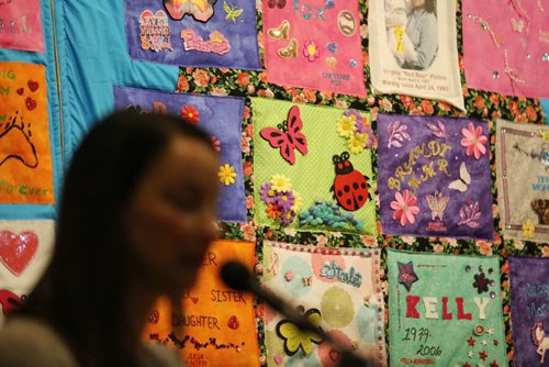 Nahanni Fontaine helps unveil a quilt honouring MMIW at the WAG, Friday, December 4, 2015. (TREVOR HAGAN / WINNIPEG FREE PRESS)