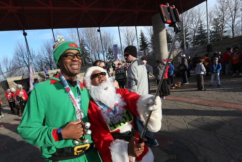 December 5, 2015 - 151205   -  Winston Harding and Santa, a.k.a. Clemus Laurila pose for a selfie at the Salvation Army Santa Shuffle Saturday, December 5, 2015. John Woods / Winnipeg Free Press