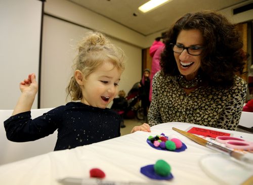 Lyla Nedelec, 3, and her grandmother, Hennie Corrin, making holiday decorations at the Winnipeg Art Gallery, Saturday, December 5, 2015. (TREVOR HAGAN/WINNIPEG FREE PRESS)