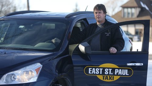 Lockport/East St. Paul  Taxi owner Glen Phillips with one of his cars. He says Unicity and Duffys are encroaching illegally on his territory and driving him out of business.  Wayne Glowacki / Winnipeg Free Press Dec. 7  2015