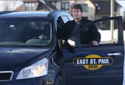Lockport/East St. Paul  Taxi owner Glen Phillips with one of his cars. He says Unicity and Duffys are encroaching illegally on his territory and driving him out of business.  Wayne Glowacki / Winnipeg Free Press Dec. 7  2015