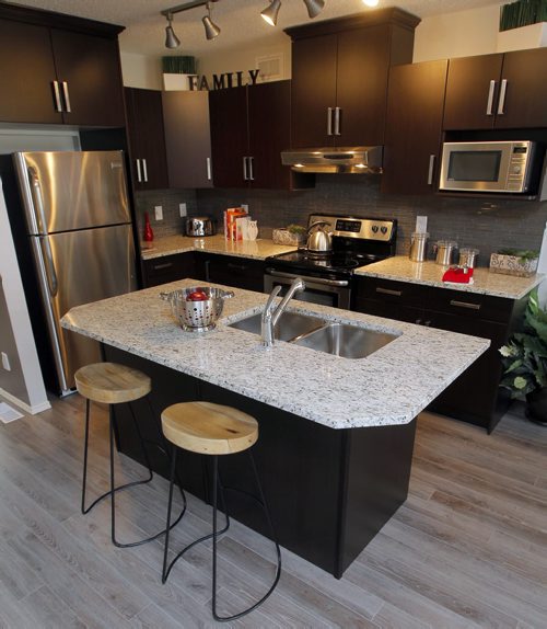 WINNIPEG, MB - NEW HOMES - 84 Danakas Drive  The Atwood Lane Condominiums. Kitchen has an island. BORIS MINKEVICH / WINNIPEG FREE PRESS DEC 7, 2015