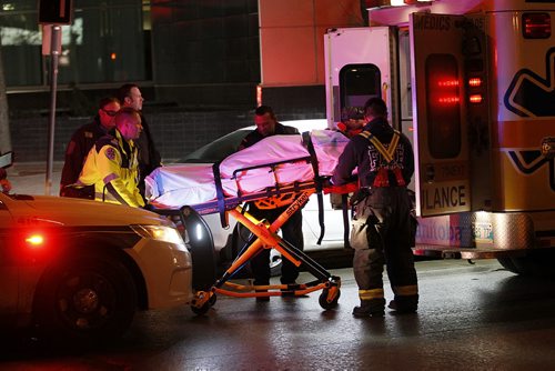 December 7, 2015 - 151207  -  Emergency crews were called to the parking lot at the back of Air Canada building on Carlton for a stabbing victim Monday, December 7, 2015.  John Woods / Winnipeg Free Press