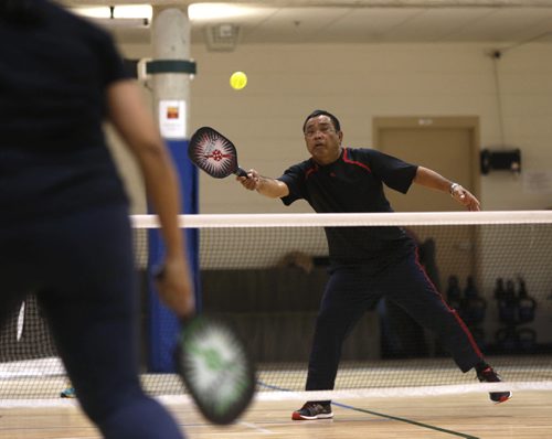 49.8 PULSE - Pickle ball.   Pickle ball player Paul Diana returns ball  in doubles game at the Wellness Institute at Seven Oaks Hospital Tuesday morning.    Wayne Glowacki / Winnipeg Free Press Dec. 8  2015