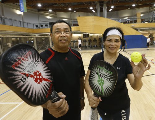 49.8 PULSE - Pickle ball.   Pickle ball players Dory Valera and her brother Paul Diana at the Wellness Institute at Seven Oaks Hospital Tuesday morning. Both have been playing  pickle ball for about 6 years.   Wayne Glowacki / Winnipeg Free Press Dec. 8  2015