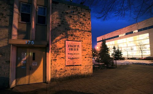 All Saints Anglican Church Parish Hall sits opposite Great West Life Tuesday evening. See Randy Turner's tale. December 8, 2015 - (Phil Hossack / Winnipeg Free Press)