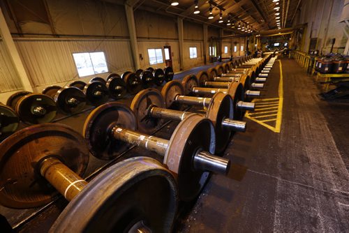 Axles fitted with train wheels in the CN Transcona Shops. The wheels were made at Griffin Wheel Company in Winnipeg  (Griffin Wheel Company in Winnipeg is owned by Amsted Rail)  Martin Cash story Wayne Glowacki / Winnipeg Free Press Dec. 10   2015
