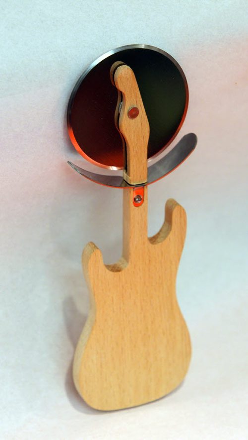 INTERSECTION - Annual goofy gift guide- Creative Paper Gallery, 1437 Corydon Ave. -  Guitar pizza cutter. BORIS MINKEVICH / WINNIPEG FREE PRESS DEC 10, 2015