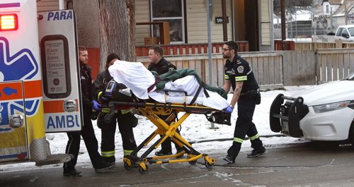 Winnipeg Police and Fire Paramedics at 594 Alfred Ave. near McGregor St. Friday morning attending an incident Friday morning that sent two to hospital.  Wayne Glowacki / Winnipeg Free Press Dec. 11   2015